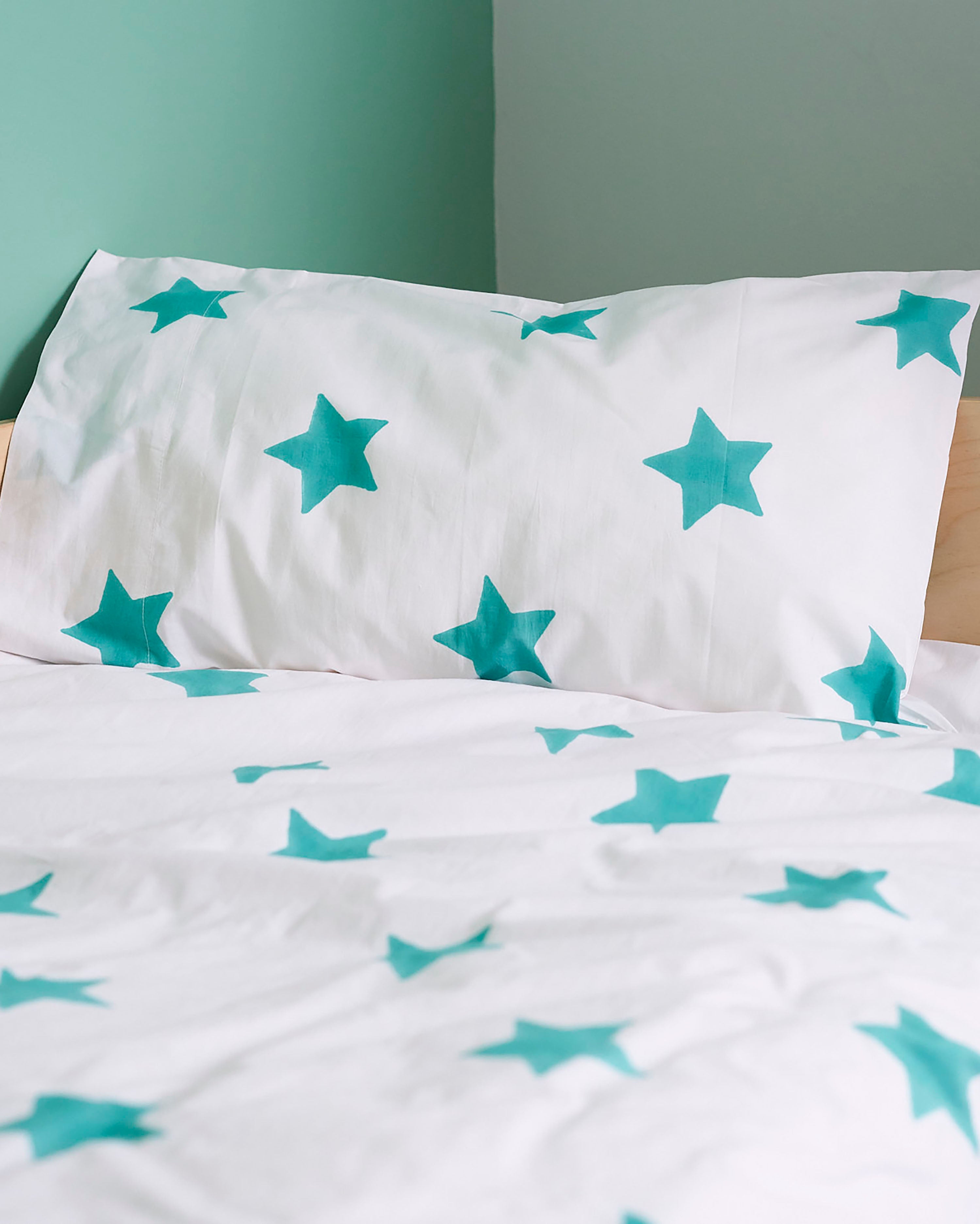 Tuquoise Star toddler cot bed duvet set