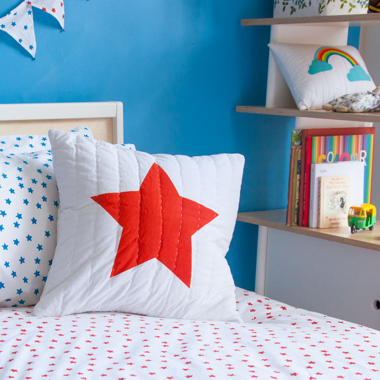 Blue & red star printed cushion