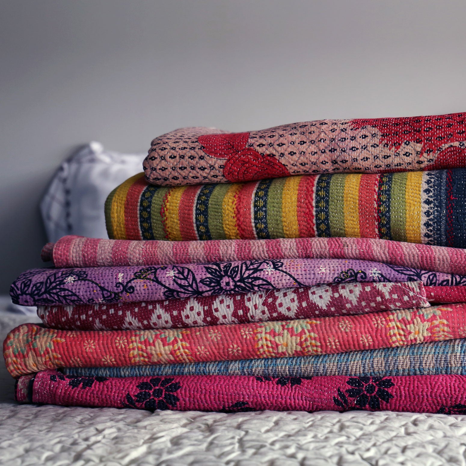 Orange & green tie-dye kantha quilt