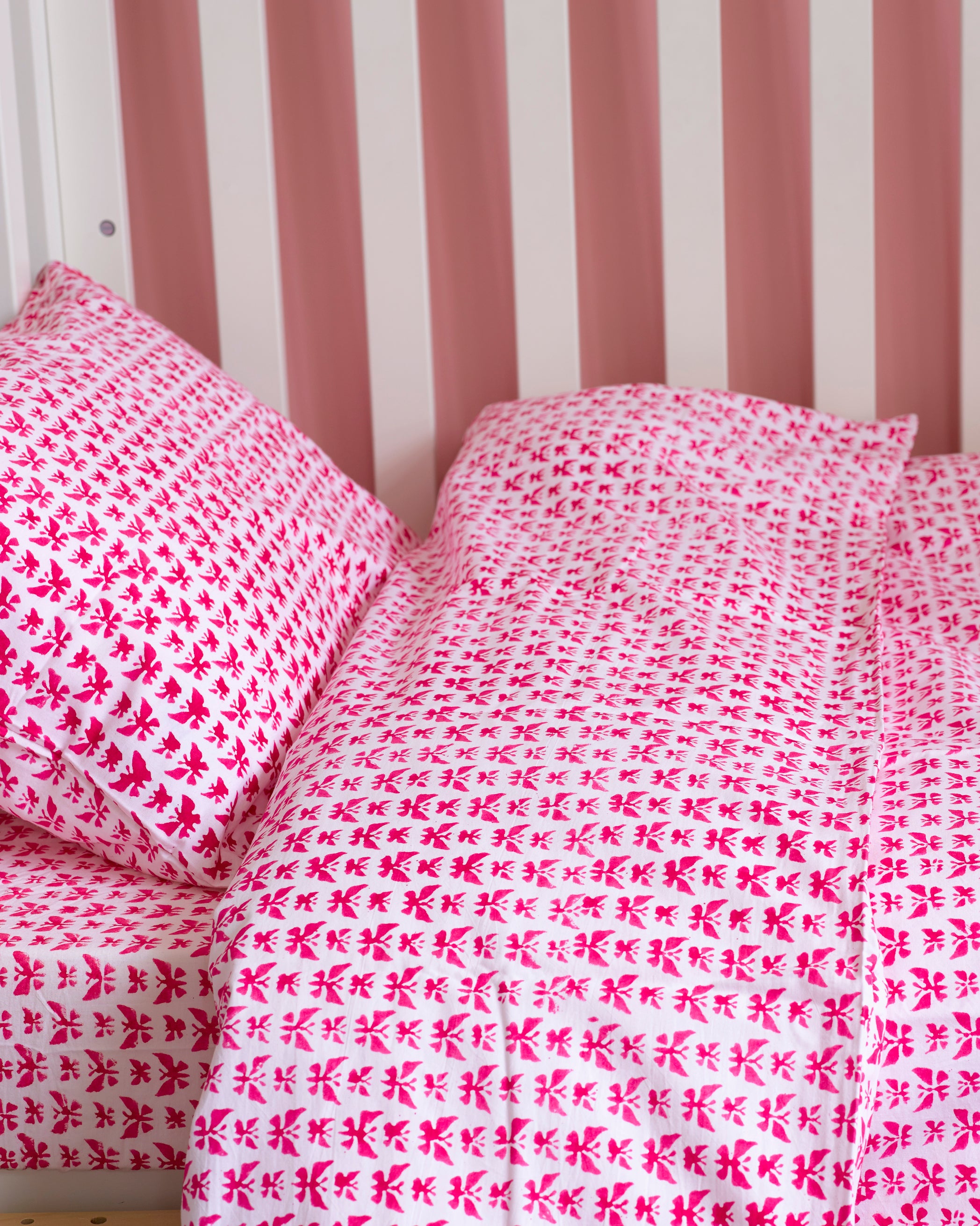 Pink butterfly toddler cot bed duvet set