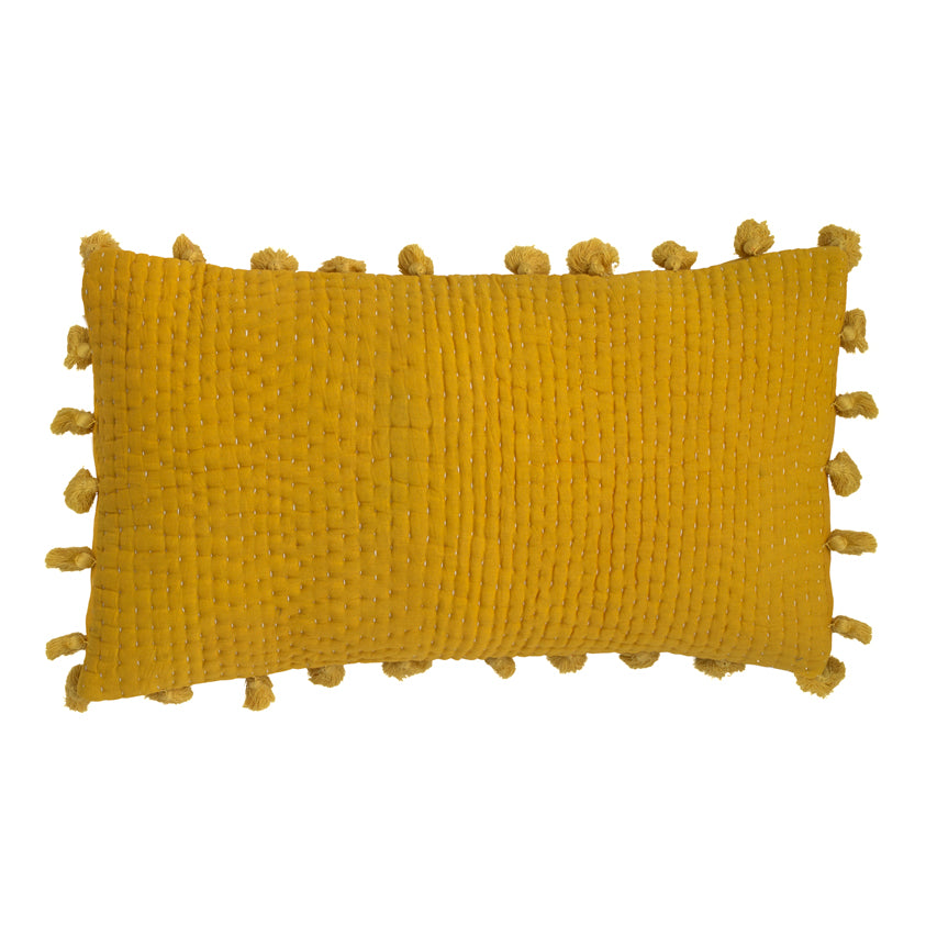 Yellow pompom quilted cushion
