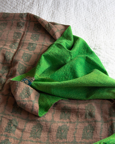 Vibrant green kantha quilt