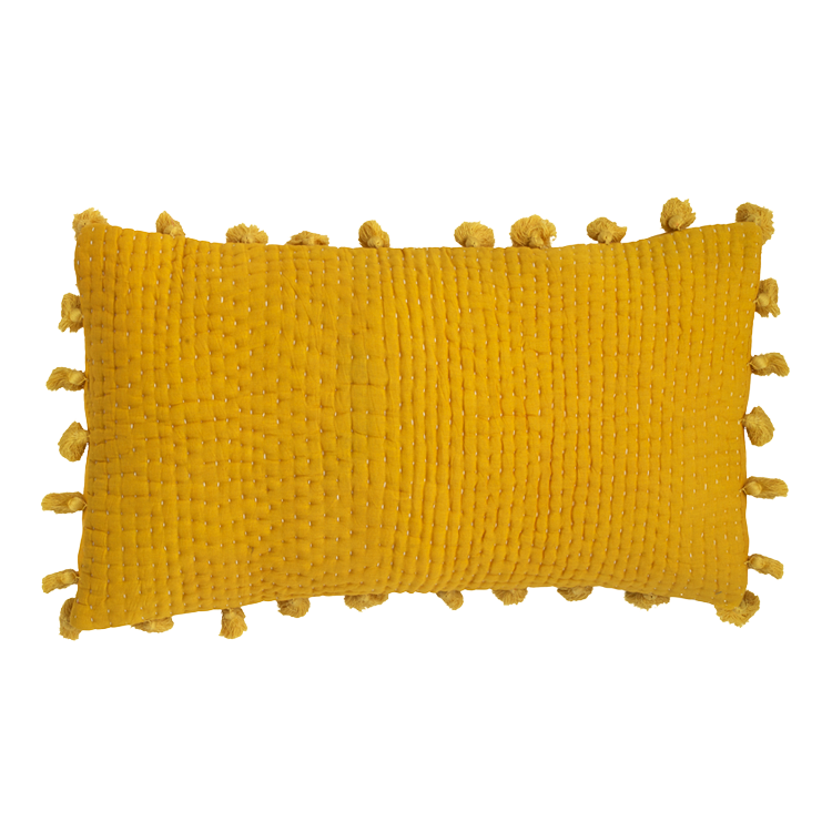 Yellow pompom quilted cushion